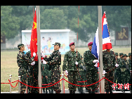 A flag-raising ceremony is held at the Chinese and Thai joint counter-terrorism military drill, code-named 'Strike-2010', in Guilin, South China's Guangxi Zhuang autonomous region, on Friday, Oct 8, 2010. [Chinanews.com] 
