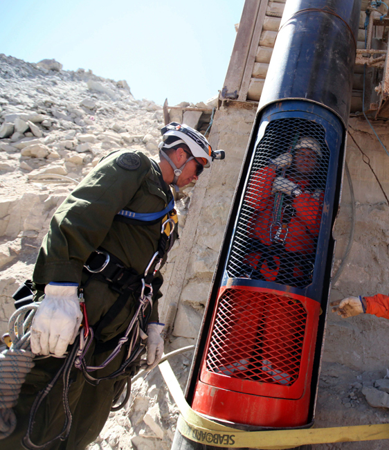 Rescuers successfully tested a capsule to hoist Chile&apos;s 33 trapped miners to freedom and aim to start evacuating them on October 12 night after a two-month ordeal that has gripped the world&apos;s imagination. [Xinhua]