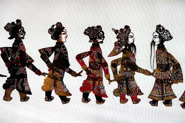 Photo taken on Oct. 12, 2010 shows the collections of shadow play puppets in He Zehua's museum in Shuidong Town, Xuancheng City of east China's Anhui Province. 