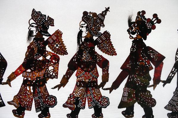 Photo taken on Oct. 12, 2010 shows the collections of shadow play puppets in He Zehua's museum in Shuidong Town, Xuancheng City of east China's Anhui Province.