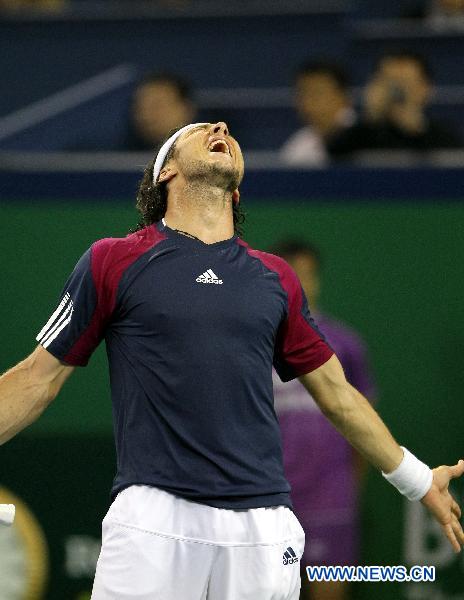 Juan Monaco of Argentina celebrates after the quarterfinal match against Jurgen Melzer of Austria at the Shanghai Masters ATP tennis tournament in Shanghai, China, Oct. 15, 2010. Monaco won 2-1. [Fan Jun/Xinhua]