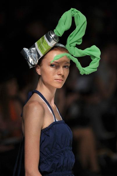 A model presents a creation by Ukrainian designer Larisa Lobanova during Ukrainian Fashion Week in Kiev October 16, 2010. (Xinhua/AFP Photo)