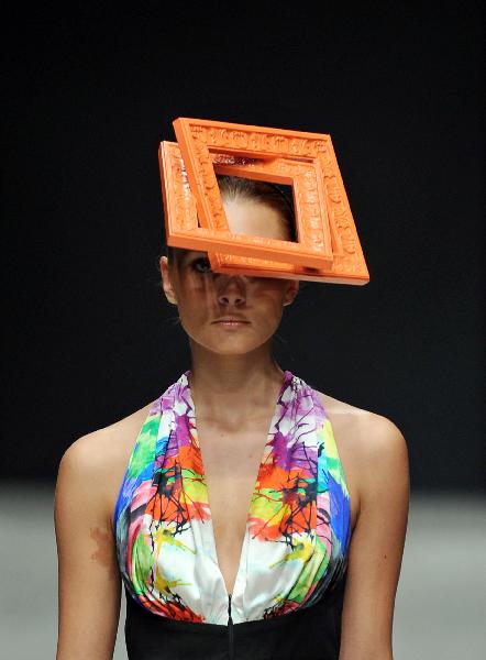 A model presents a creation by Ukrainian designer Larisa Lobanova during Ukrainian Fashion Week in Kiev October 16, 2010. (Xinhua/AFP Photo)