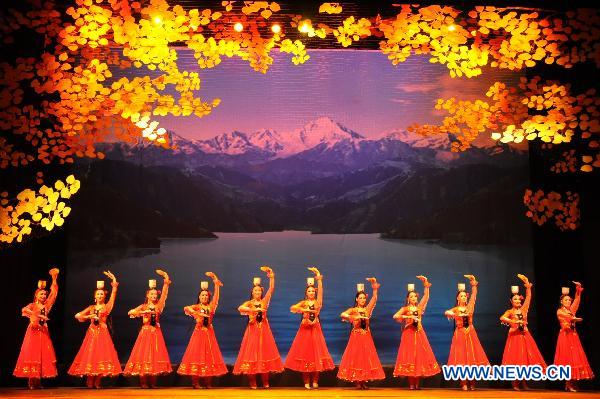 Actresses perform group dance during a large-scale Chinese cultural event termed 'Experience China in Turkey' in Ankara, capital of Turkey, Oct. 17, 2010. The event kicked off with an ethnic dance and singing show in the Turkish capital of Ankara on Sunday night, drawing cheers and applauses from the audiences.