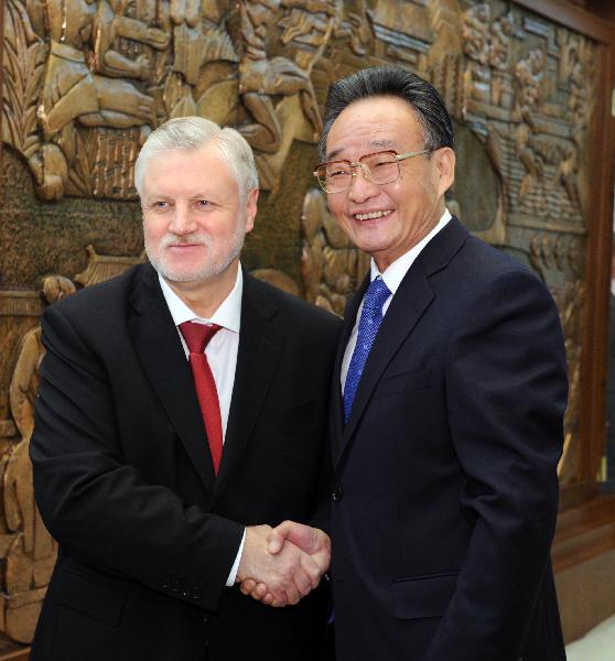 Wu Bangguo (R), chairman of the Standing Committee of China's National People's Congress, meets with Sergei Mironov, chairman of Russia's Federation Council, in Beijing, capital of China, Oct. 18, 2010. [Rao Aimin/Xinhua]