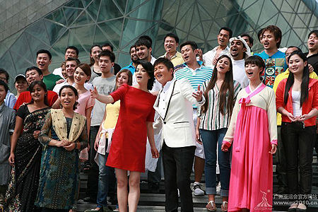 People from different parts of Asia sing 'Reunion' together in front of Guangzhou Opera House during the MV shooting