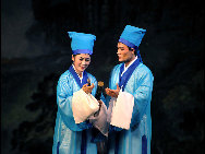 Korean Central News Agency (KCNA), the official news outlet of North Korea, released stage photos of Butterfly Lovers, a musical adapted from a well-known Chinese love story, on October 19, 2010. The Butterfly Lovers, telling the tragic love story of Liang Shanbo and Zhu Yingtai, who lived in the Eastern Jin Dynasty some 1,700 years ago, is often regarded as the Chinese equivalent of Romeo and Juliet.