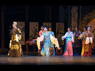 Korean Central News Agency (KCNA), the official news outlet of North Korea, released stage photos of Butterfly Lovers, a musical adapted from a well-known Chinese love story, on October 19, 2010. The Butterfly Lovers, telling the tragic love story of Liang Shanbo and Zhu Yingtai, who lived in the Eastern Jin Dynasty some 1,700 years ago, is often regarded as the Chinese equivalent of Romeo and Juliet.