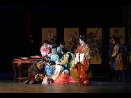 Korean Central News Agency (KCNA), the official news outlet of North Korea, released stage photos of Butterfly Lovers, a musical adapted from a well-known Chinese love story, on October 19, 2010. The Butterfly Lovers, telling the tragic love story of Liang Shanbo and Zhu Yingtai, who lived in the Eastern Jin Dynasty some 1,700 years ago, is often regarded as the Chinese equivalent of Romeo and Juliet.