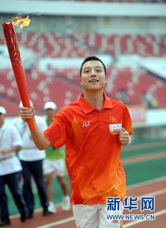 Weiqi master Gu Li during the Torch Relay 