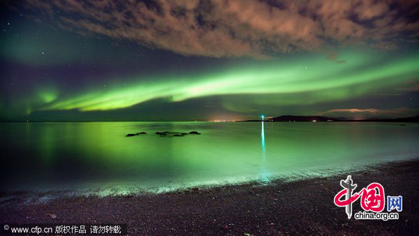 The Lighthouse at Grotta is often graced with the divine green in Seltjarnarnes, Iceland. [CFP]