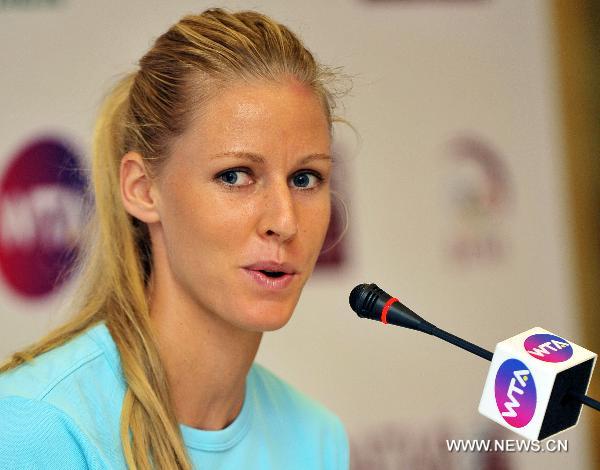 Elena Dementieva of Russia speaks during the press conference prior to the WTA Championships 2010 in Doha, Qatar, on Oct. 25, 2010. The tennis event will be staged here from Oct. 26 to 30. [Xinhua/Chen Shaojin]