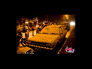 A car is covered with ash from the erupting Mount Merapi volcano at Kaliurang village in Sleman, on October 26, 2010 near Yogyakarta, Indonesia. [CFP]