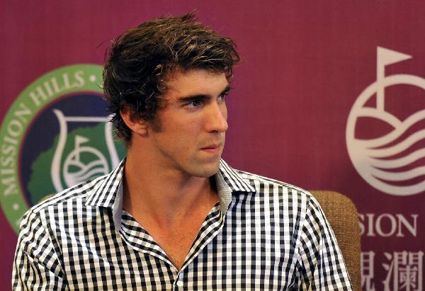 US swimmer Michael Phelps looks on during the press conference for the Mission Hills Star Trophy in Haikou, south China's Hainan Province, Oct. 27, 2010. The Mission Hills Star Trophy is held between Oct. 28 and Oct. 31. Twenty professional golfers along with 20 celebrities and 120 amateurs will be taking part in Star Trophy. (Xinhua/Guo Cheng)