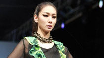 A model displays a creation of Brand 'Chatelaine by Jaison' during 2011 Seoul Fashion Week in Seoul, capital of South Korea, Oct. 28, 2010.