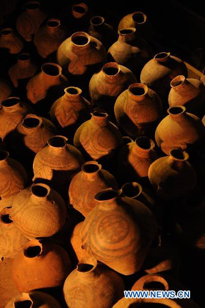 Ancient painted potteries are seen in the Liuwan Painted Pottery Museum at Liuwan Village of Ledu County, northwest China's Qinghai Province, Oct. 24, 2010. The museum houses some 40,000 ancient painted potteries, making it the largest of the kind in China. 
