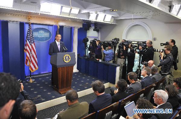 U.S. President Barack Obama makes a statement to the press at the White House in Washington D.C., capital of the United States, Oct. 29, 2010. Obama said on Friday that initial tests on two packages found on cargo planes bound for the U.S. confirmed they 'apparently contain explosive material,' and investigators had discovered a 'credible terrorist threat' against the U.S.. [Zhang Jun/Xinhua]