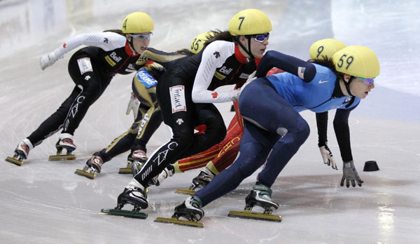 Katherine Reutter (59) of the US, China&apos;s Zhou Yang (9), Canada&apos;s Marie-Andree Mendes-Campeau (7), Japan&apos;s Biba Sakurai (35) and Canada&apos;s Valerie Maltais (4) skate during the women&apos;s 1500 meters final at the ISU World Cup Short Track speed skating competition in Quebec City, Oct 30, 2010. Zhou won the competition, Reutter finished second and Sakurai finished third. [China Daily/Agencies]