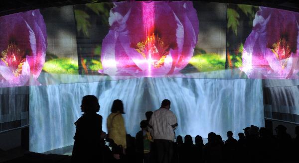 People visit the Pavilion of Angel Life during an activity held by the 2010 Taipei International Flora Expo in Taipei, southeast China's Taiwan, Oct. 30, 2010. The 2010 Taipei International Flora Expo will run from Nov. 6, 2010 to April 25, 2011. [Xinhua/Wu Ching-teng]