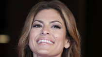 U.S. actress Eva Mendes poses as she arrives on the red carpet at the Rome Film Festival October 29, 2010.