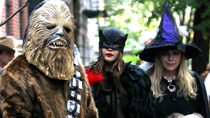 Liv Tyler and son Milo celebrate Halloween in costumes outside their house in NYC.