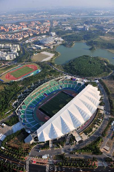 The photo taken on Oct. 29, 2010 shows the ariel view of the stadium of University Town in Guangzhou, south China&apos;s Guangdong Province. It will host the football and rugby match of the 16th Asian Games. [Xinhua]