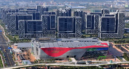 The photo taken on Oct. 29, 2010 shows the Main Media Centre for the 16th Asian Games in Guangzhou, southern China's Guangdong Province. The Main Media Centre including MPC (Main Press Centre) and IBC (International Broadcasting Centre) opens on Nov. 1, 2010. (photo/Liu Dawei)  