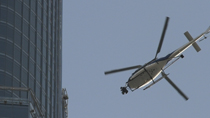 Tom Cruise performs a hair-raising stunt dangle in Duabi.The star is filming at the Burj Khalifa, which stands 2,717 feet tall, for his new movie Mission: Impossible 4.