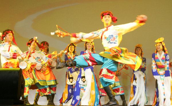 Performers from China's Sichuan Nationality Song and Dance Troupe perform Qiang nationality dance at the Manhattan Center in New York, the United States, Oct. 31, 2010. The performance is a part of series activities of 'Cultural China--Splendid Sichuan'. [Xinhua photo] 