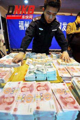 China introduces judicial interpretation against fake money crime