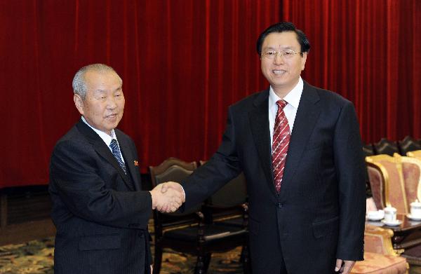 Chinese Vice Premier Zhang Dejiang (R) shakes hands with the Democratic People's Republic of Korea(DPRK) Premier Choe Yong Rim during their meeting in Changcun, northeast China's Jilin Province, Nov. 3, 2010. [Wang Haofei/Xinhua]