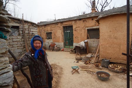 Dozens of families in a village in Jinan, Shandong Province moved out of their single-story homes in 2008 and into new apartments. Some villagers are refusing to change their lifestyle and complained of being cheated by developers. Photo: IC