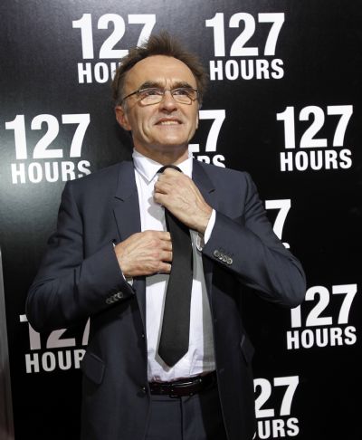 Director of the movie '127 Hours' Danny Boyle adjusts his tie as he poses at its premiere at Samuel Goldwyn theatre in Beverly Hills Director of the movie '127 Hours' Danny Boyle adjusts his tie as he poses at its premiere at Samuel Goldwyn theatre in Beverly Hills, California November 3, 2010. The movie opens in the U.S. on November 5. (Xinhua/Reuters)