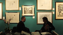 Visitors view engraving artworks during the preview of the 20th Print Fair in New York of the United States, Nov. 3, 2010.