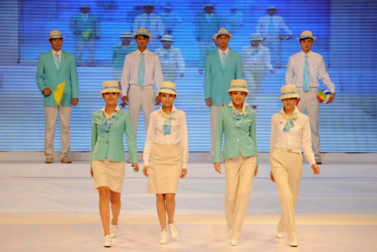 Models present the staff uniforms for the 2010 Asian Games in Guangzhou, South China&apos;s Guangdong province, on Sunday Nov 7, 2010. [Xinhua]