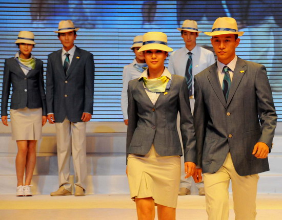 Models present the staff uniforms for the 2010 Asian Games in Guangzhou, South China&apos;s Guangdong province, on Sunday Nov 7, 2010. [Xinhua] 