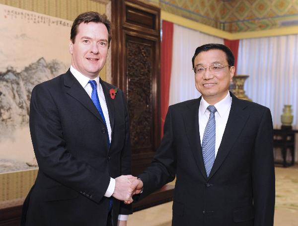 Chinese Vice Premier Li Keqiang (R) meets with British Chancellor of the Exchequer George Osborne who will attend the third China-UK Economic and Financial Dialogue, in Beijing, capital of China, Nov. 8, 2010. [Xie Huanchi/Xinhua]