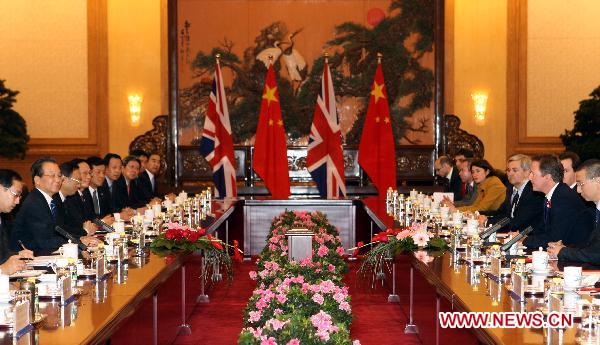 Chinese Premier Wen Jiabao (2nd L) holds talks with British Prime Minister David Cameron (2nd R) in Beijing, capital of China, Nov. 9, 2010. [Yao Dawei/Xinhua] 