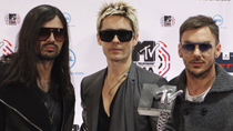 Members of the band 30 Seconds to Mars pose with their Best Rock award at the MTV Europe Music Awards 2010 in Madrid November 7, 2010.