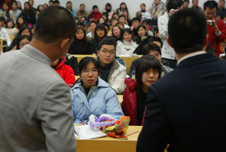 A gay couple is invited to talk about their life together to students at a 'Homosexuality Study' seminar of Fudan University in Shanghai. 