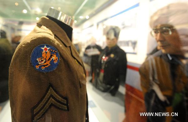 A Flying Tigers uniform is seen at the exhibition of Flying Tigers relics in Kunming, capital of southwest China&apos;s Yunnan Province, Nov. 9, 2010. [Xinhua]