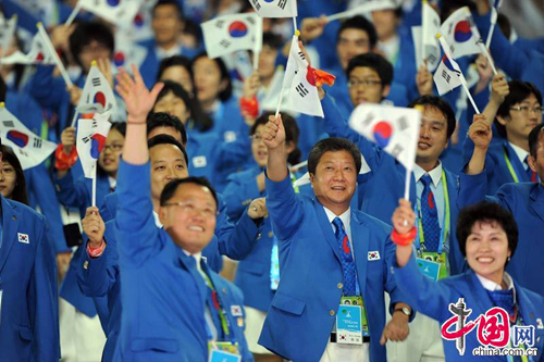 Athletes from Macao, China march in at Asiad Opening Ceremony.