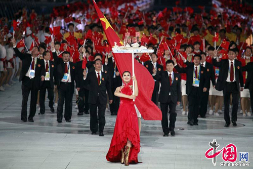 Athletes from People's Republic of China march in at Asiad Opening Ceremony.