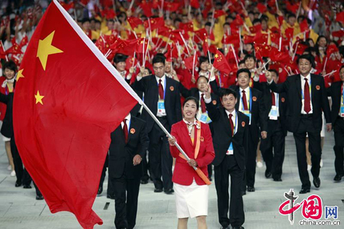 Athletes from People's Republic of China march in at Asiad Opening Ceremony.