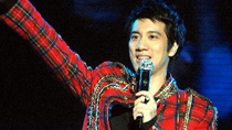 Singer Lee Hom Wang performs during a pop music concert at the Xinhua Road Stadium in Wuhan, capital of central of China's Hubei Province, Nov. 12, 2010.