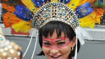 A woman participates in the gay parade in the Copacabana beach in Rio de Janeiro, Brazil, Nov. 14, 2010.