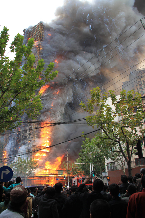 Death toll from the fire in a downtown Shanghai apartment block Monday had risen to 49, said a statement from the municipal publicity department. The 28-story building at the intersection of Jiaozhou Road and Yuyao Road in Jing&apos;an District was being renovated when it caught fire at about 2:15 p.m.. [Xinhua]