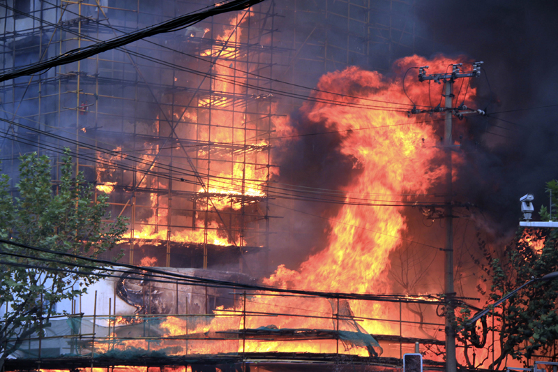 Death toll from the fire in a downtown Shanghai apartment block Monday had risen to 49, said a statement from the municipal publicity department. The 28-story building at the intersection of Jiaozhou Road and Yuyao Road in Jing&apos;an District was being renovated when it caught fire at about 2:15 p.m.. [Xinhua]