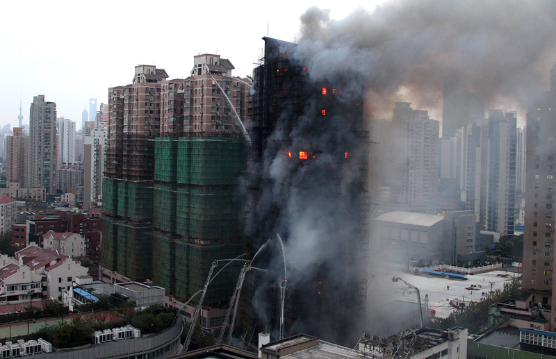 Death toll from the fire in a downtown Shanghai apartment block Monday had risen to 49, said a statement from the municipal publicity department. The 28-story building at the intersection of Jiaozhou Road and Yuyao Road in Jing&apos;an District was being renovated when it caught fire at about 2:15 p.m.. [Xinhua]