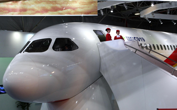 A model of the China-made C919 passenger airliner is seen at the 8th China International Aviation and Aerospace Exhibition in Zhuhai, South China&apos;s Guangdong province, Nov 15, 2010. The model, which comprises the cockpit and the front part of the passenger cabin, is the same size as an actual C919 plane -- 17 meters long, 5.6 meters high and 3.96 meters wide. [Xinhua]
